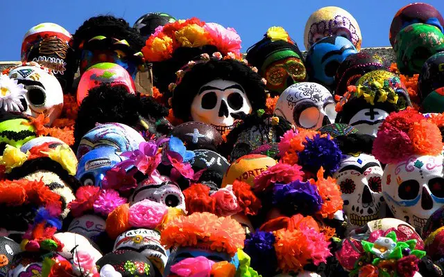 Colorful skull (calaveras) decorations as a part of an altar (ofrenda).