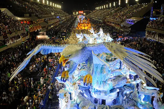 The spectacular float of the Group Especial samba school passes through the crowded sambadrome of Rio.