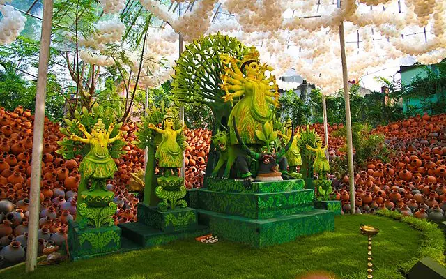 A colorful Durga Puja pandal (stage) in Kolkata during Navratri.