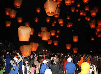 Hundreds of sky lanterns released to the sky.