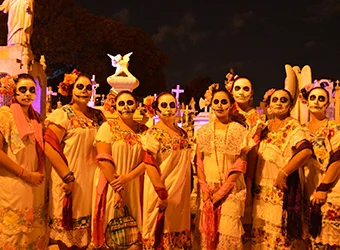 Catrina disguised women in a cemetery.