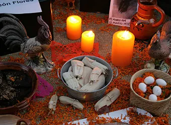Tamales laid on an altar.