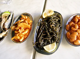 Four dishes with typical Greek fasting food.