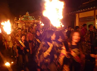 The mikoshi procession in the streets of Kurama.