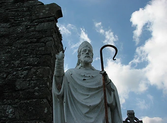 A marble statue of Saint Patrick.