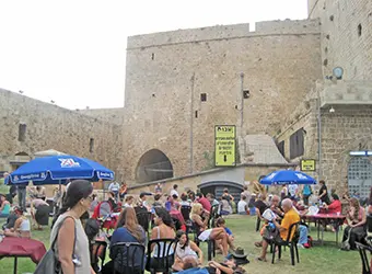 Acco Festival visitors in the old city of Acco.