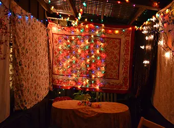 Light decorations on the walls of a Sukkah.