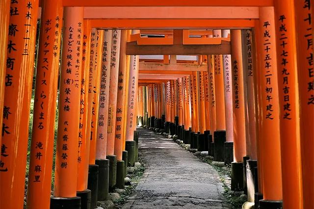 Entrance in a form of a pillar corridor at a Shinto Temple in Japan.