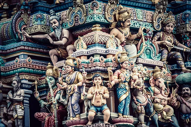 Ornaments and idols decorating a Hindu temple.