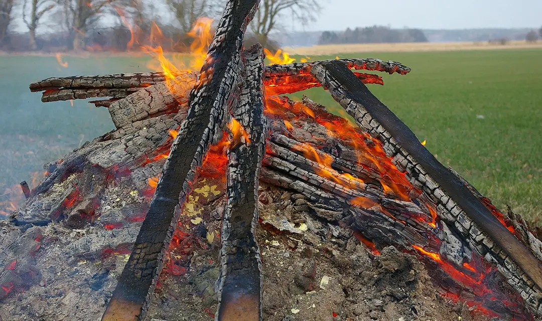A big bonfire in the fields during the celebration of Walpurgis Night.